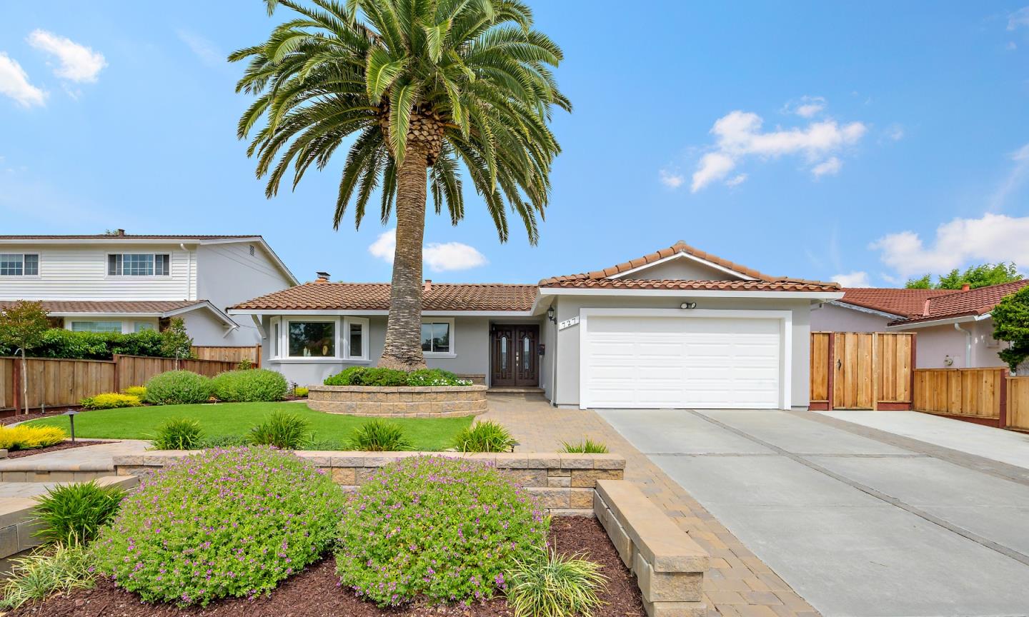 727 Liverpool Way Sunnyvale, CA 94087 - Photo 3 of 26 a front view of a house with a garden and yard