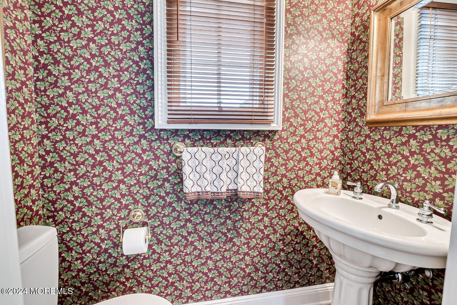 299 County Road 537 Colts Neck, NJ 07722 - Photo 16 of 62 a bathroom with a sink toilet and mirror