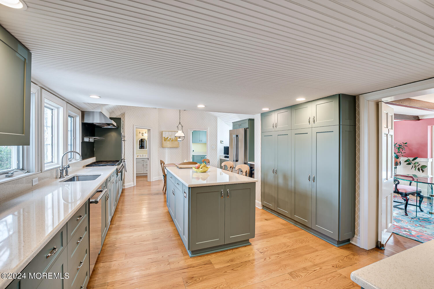 299 County Road 537 Colts Neck, NJ 07722 - Photo 20 of 62 a large kitchen with kitchen island a large counter space and stainless steel appliances