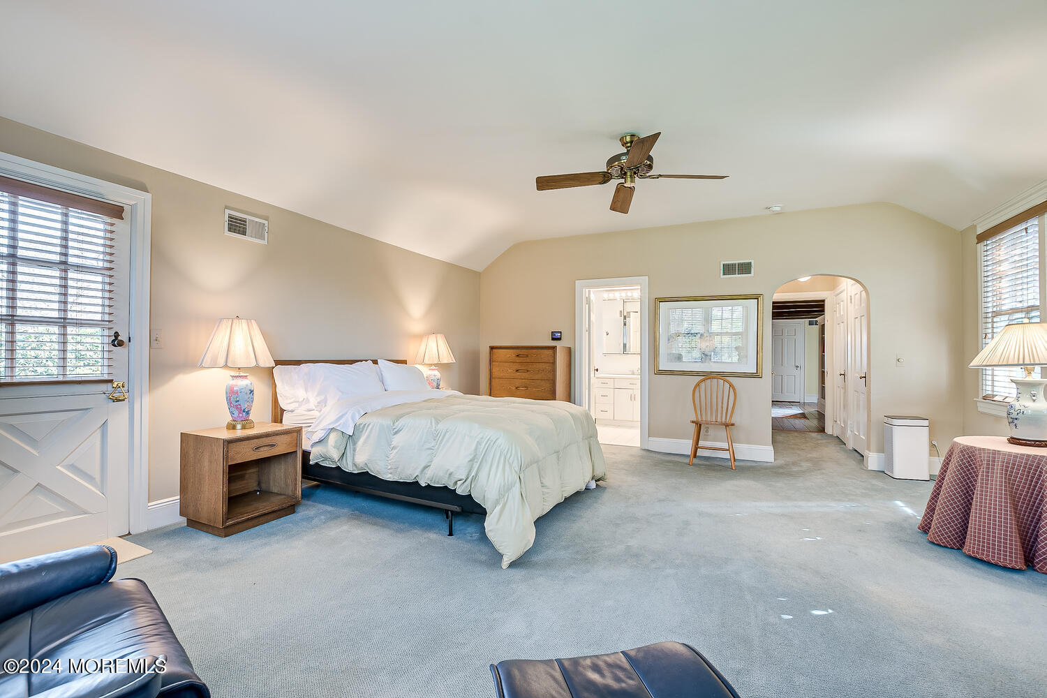 299 County Road 537 Colts Neck, NJ 07722 - Photo 27 of 62 a spacious bedroom with a bed couch and window