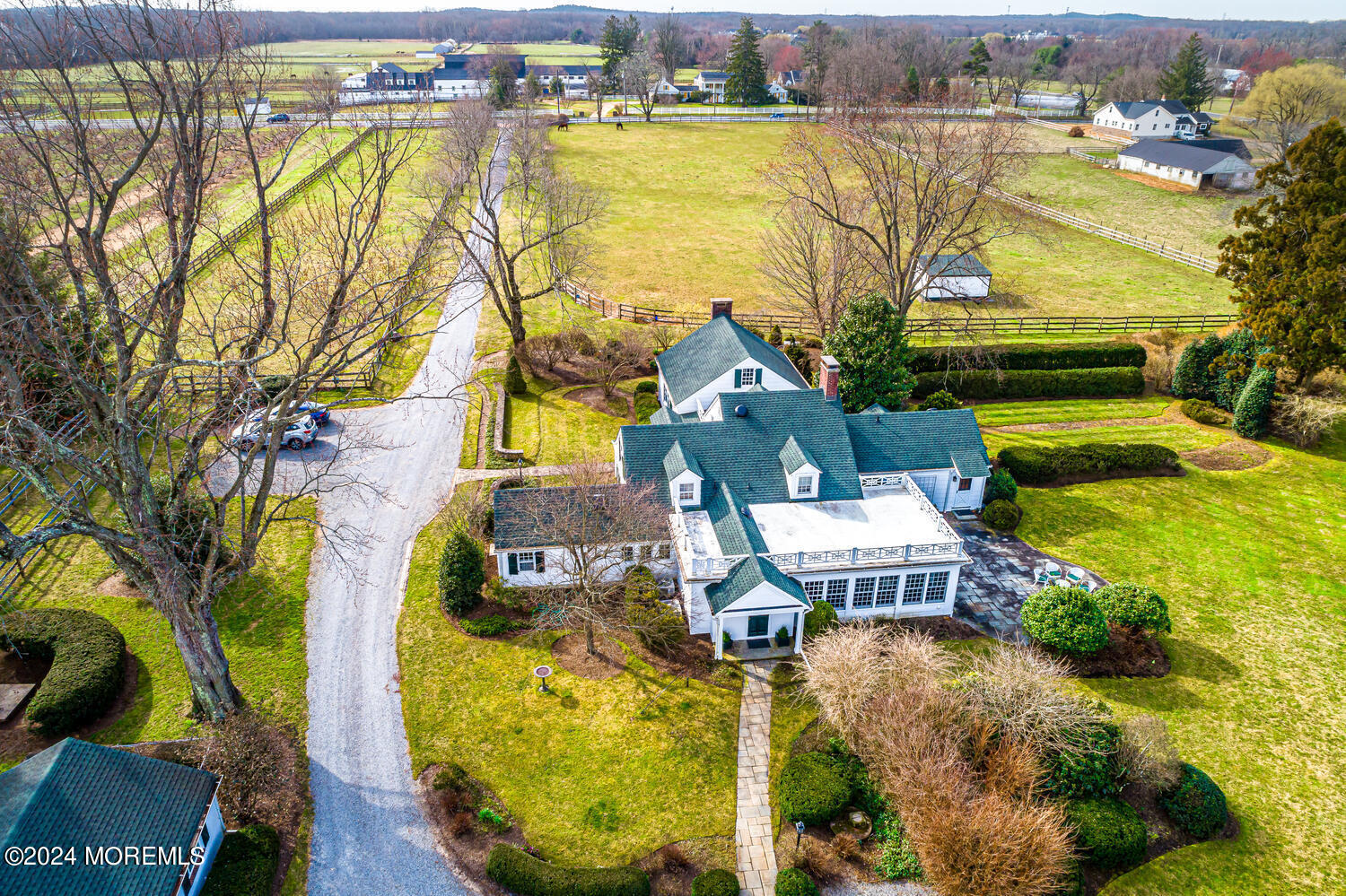 299 County Road 537 Colts Neck, NJ 07722 - Photo 3 of 62 a view of a swimming pool with a patio and a yard