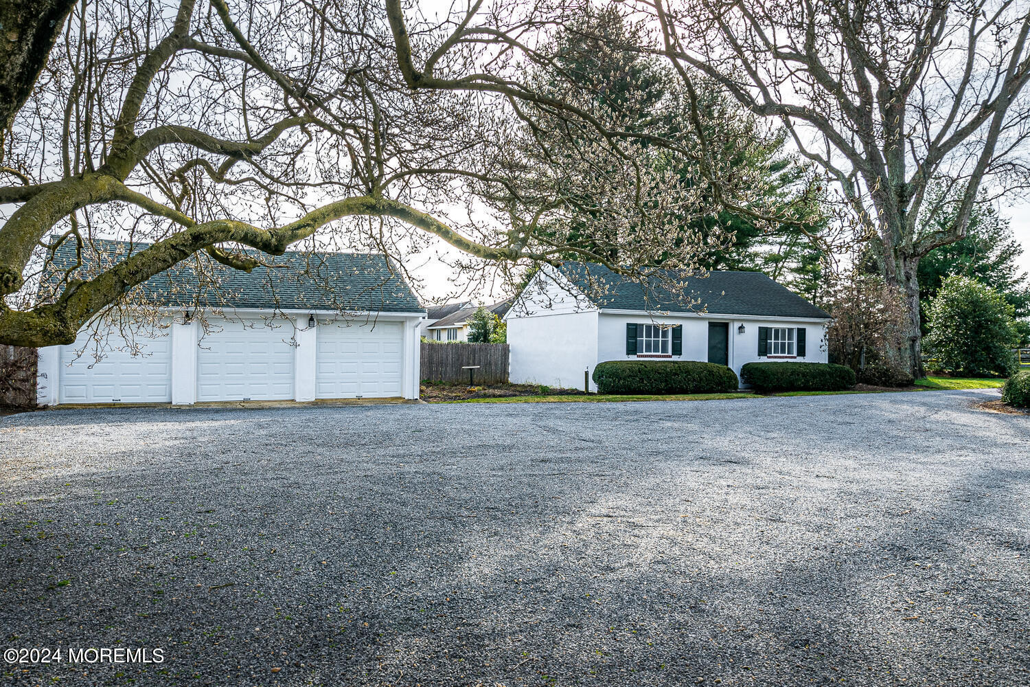 299 County Road 537 Colts Neck, NJ 07722 - Photo 40 of 62 a view of a house with a yard and garage