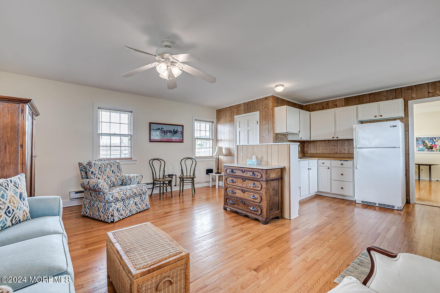 299 County Road 537 Colts Neck, NJ 07722 - Photo 42 of 62 a living room with furniture and a wooden floor