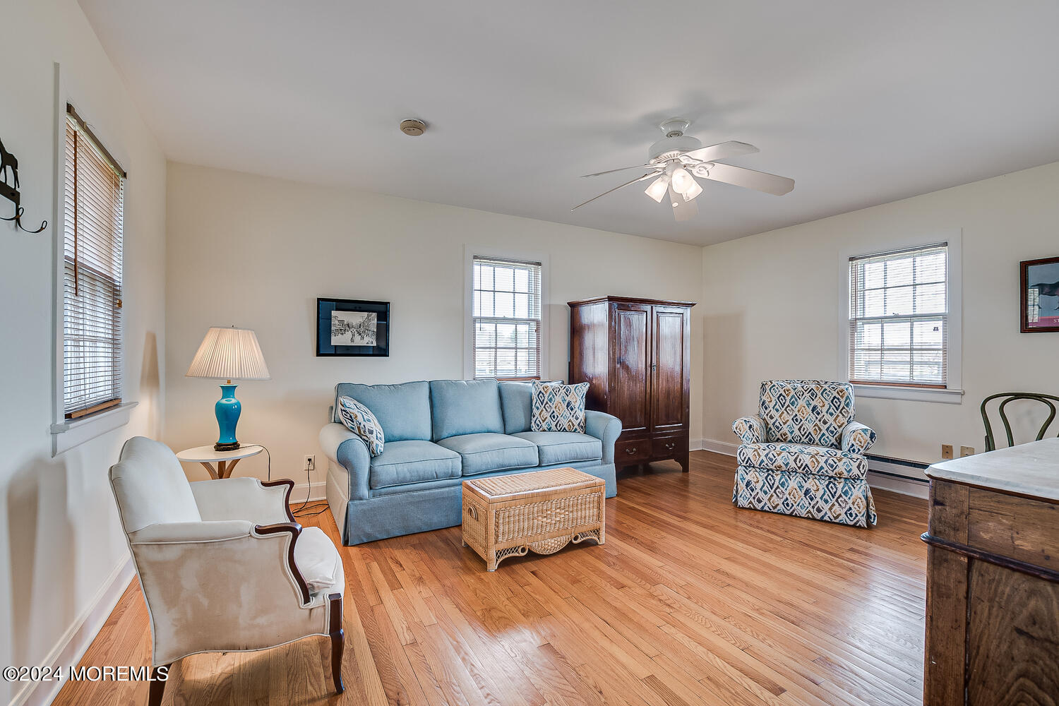 299 County Road 537 Colts Neck, NJ 07722 - Photo 43 of 62 a living room with furniture and a wooden floor