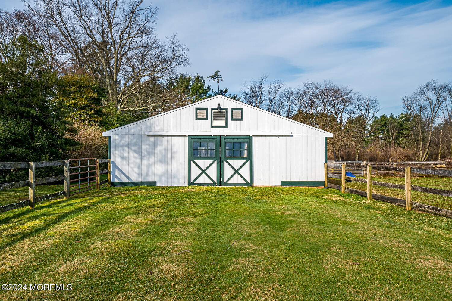 299 County Road 537 Colts Neck, NJ 07722 - Photo 47 of 62 a swimming pool with some trees in the background