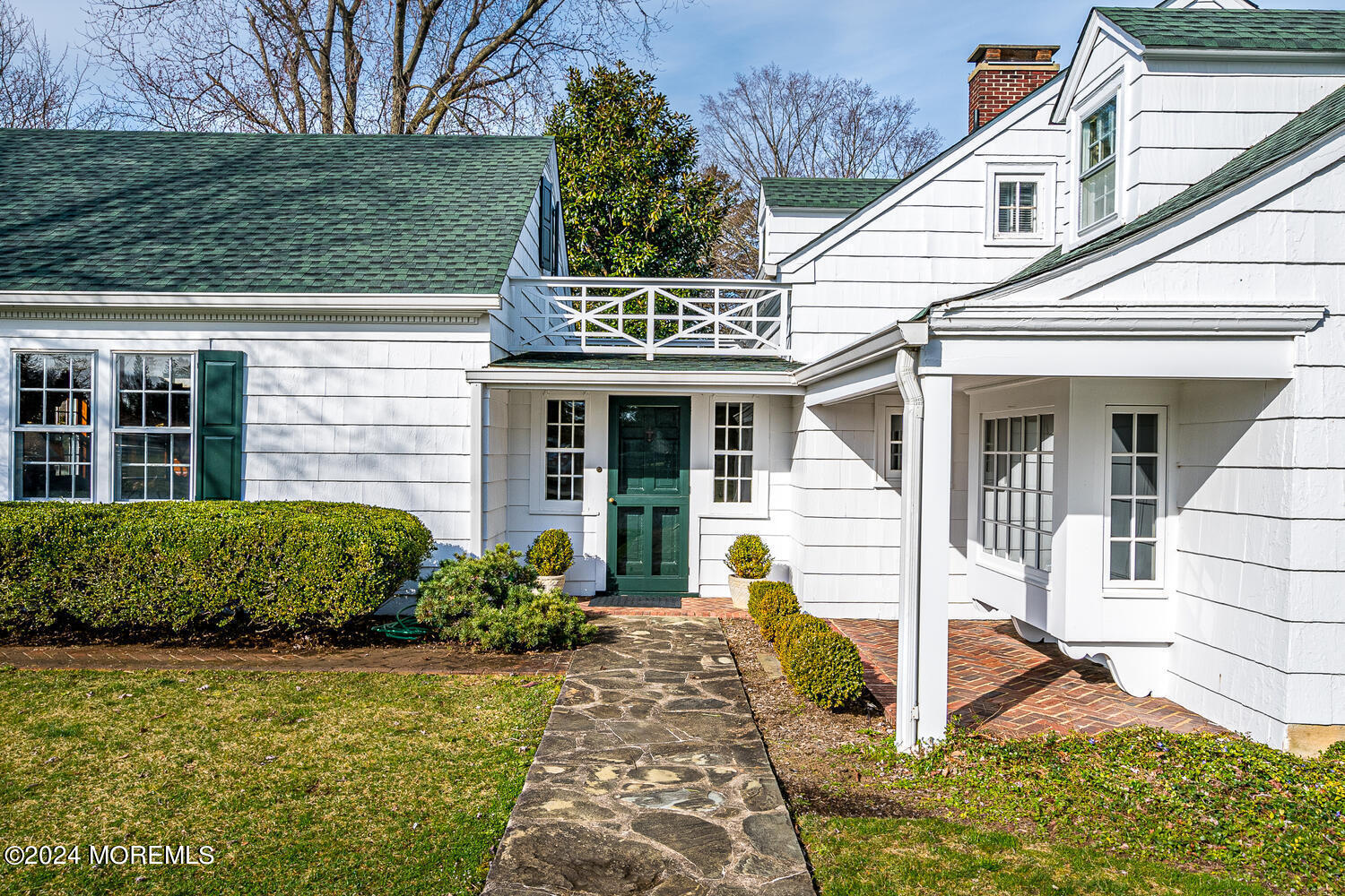 299 County Road 537 Colts Neck, NJ 07722 - Photo 10 of 62 a front view of a house with garden