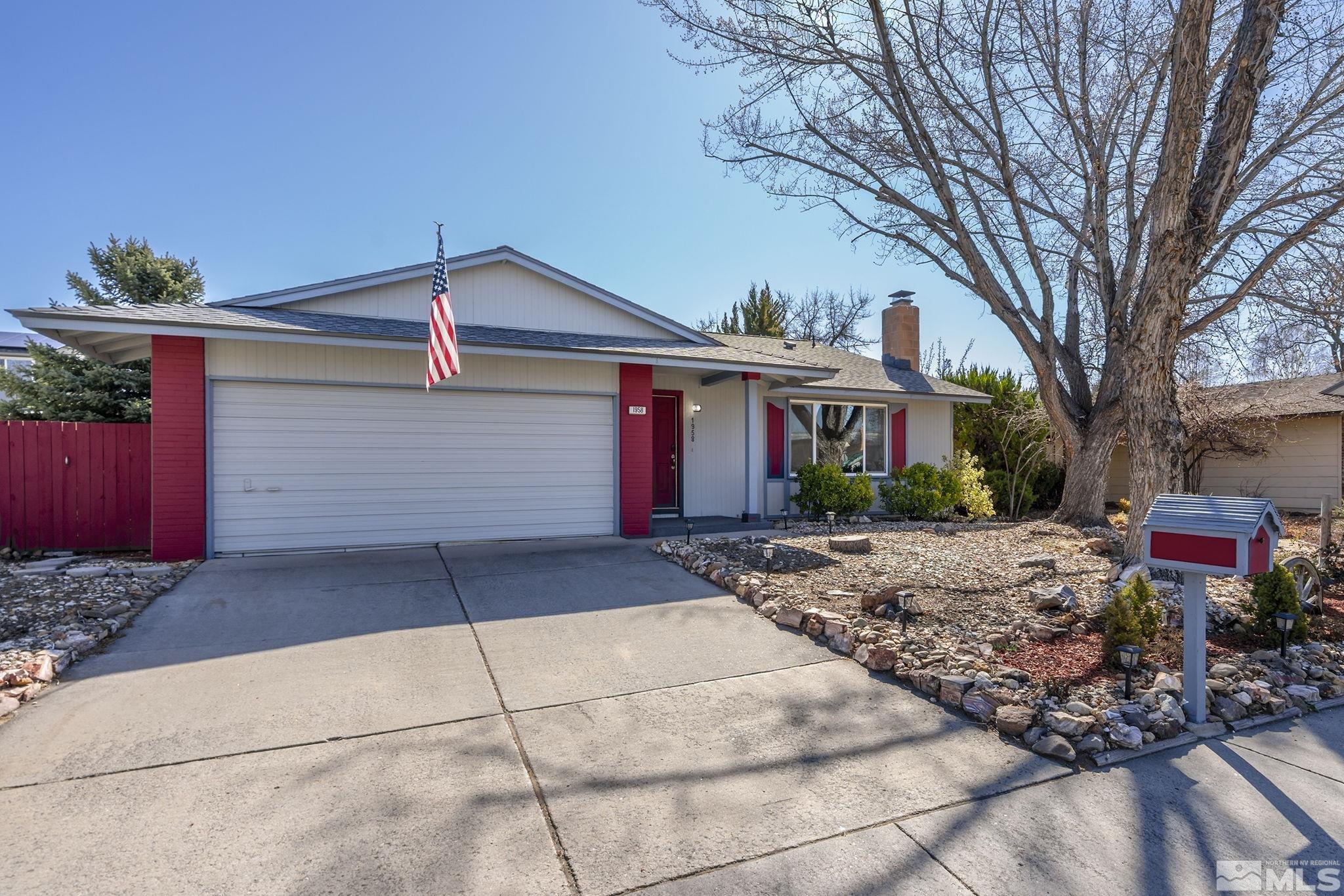 a front view of house with yard