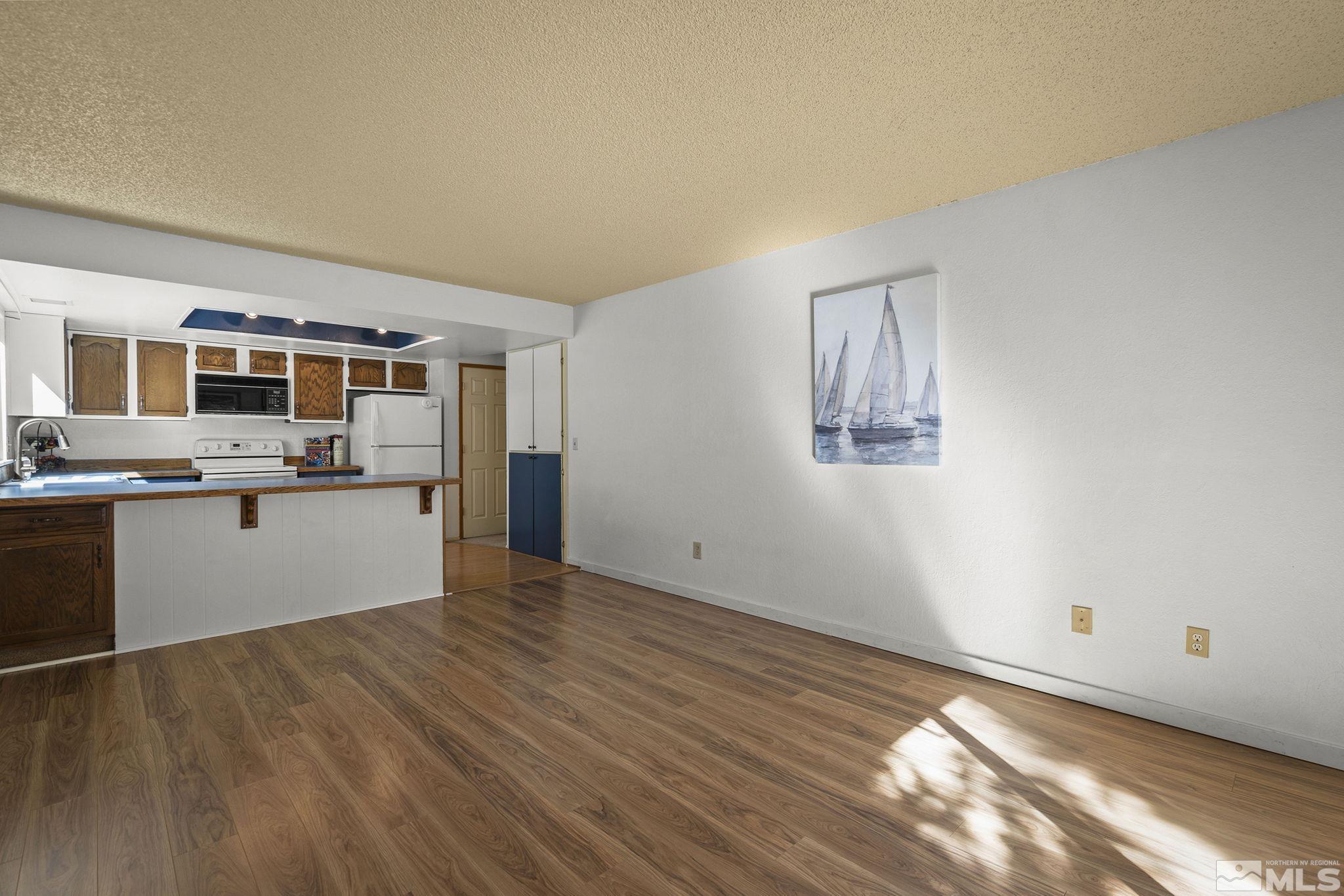 1958 Fieldcrest Drive Sparks, NV 89434 - Photo 11 of 22 a view of kitchen with wooden floor