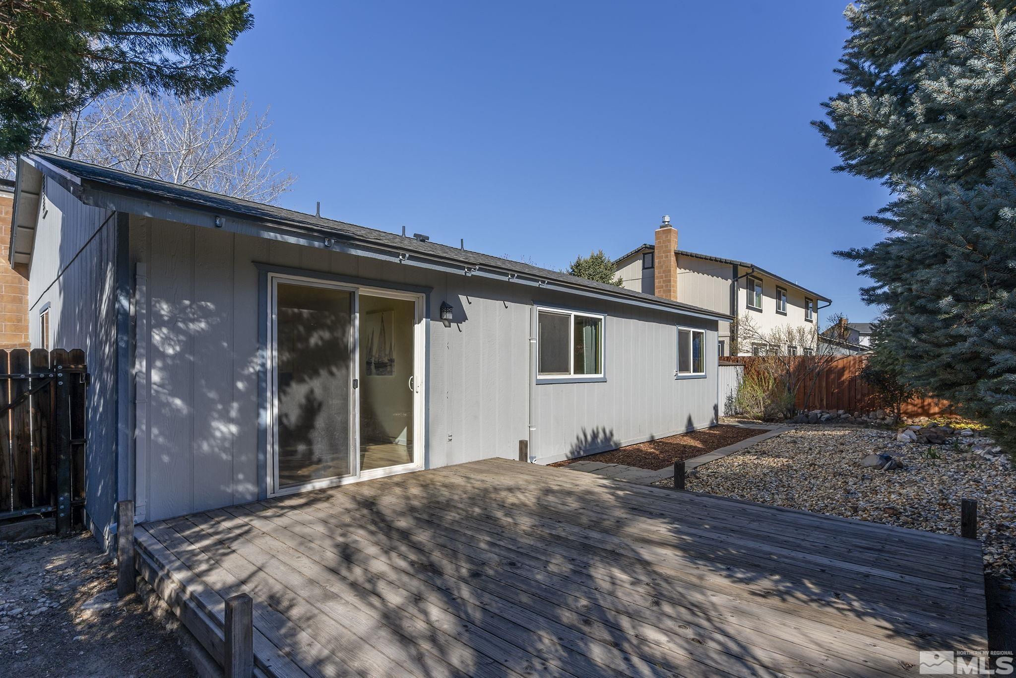 1958 Fieldcrest Drive Sparks, NV 89434 - Photo 18 of 22 a front view of a house with a yard