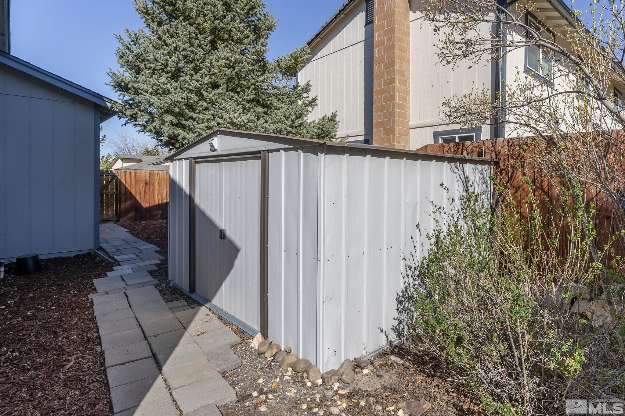 1958 Fieldcrest Drive Sparks, NV 89434 - Photo 21 of 22 a view of a wooden fence