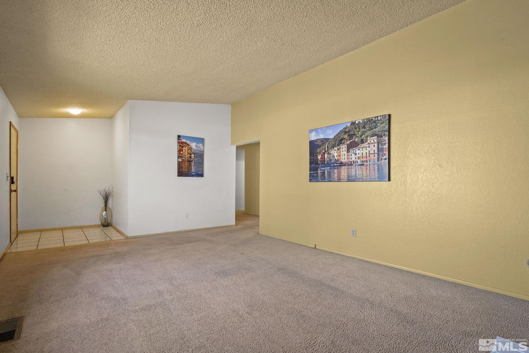 1958 Fieldcrest Drive Sparks, NV 89434 - Photo 6 of 22 an empty room with windows