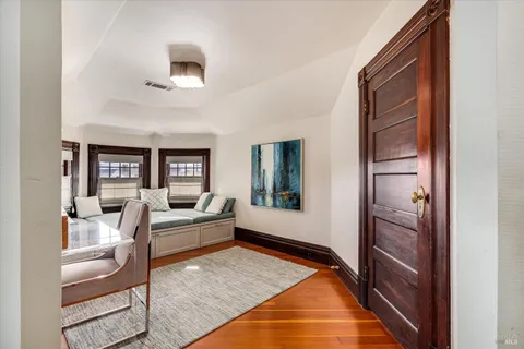a bathroom with a sink a vanity and a mirror