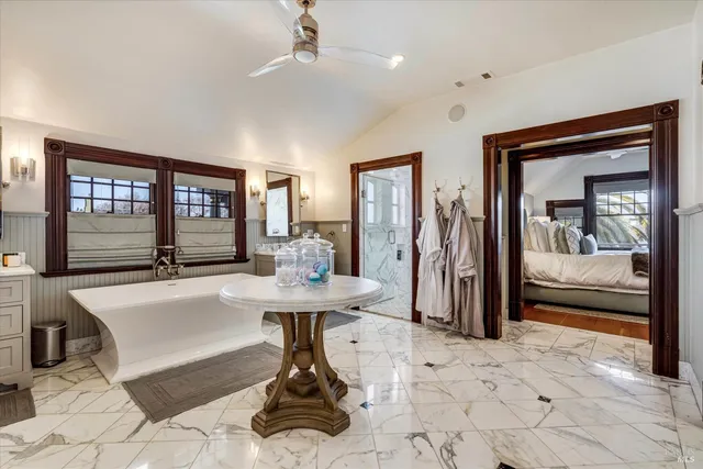 a view of room with window and wooden floor