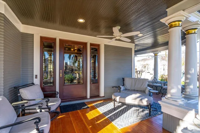 a view of livingroom with hardwood floor and hallway