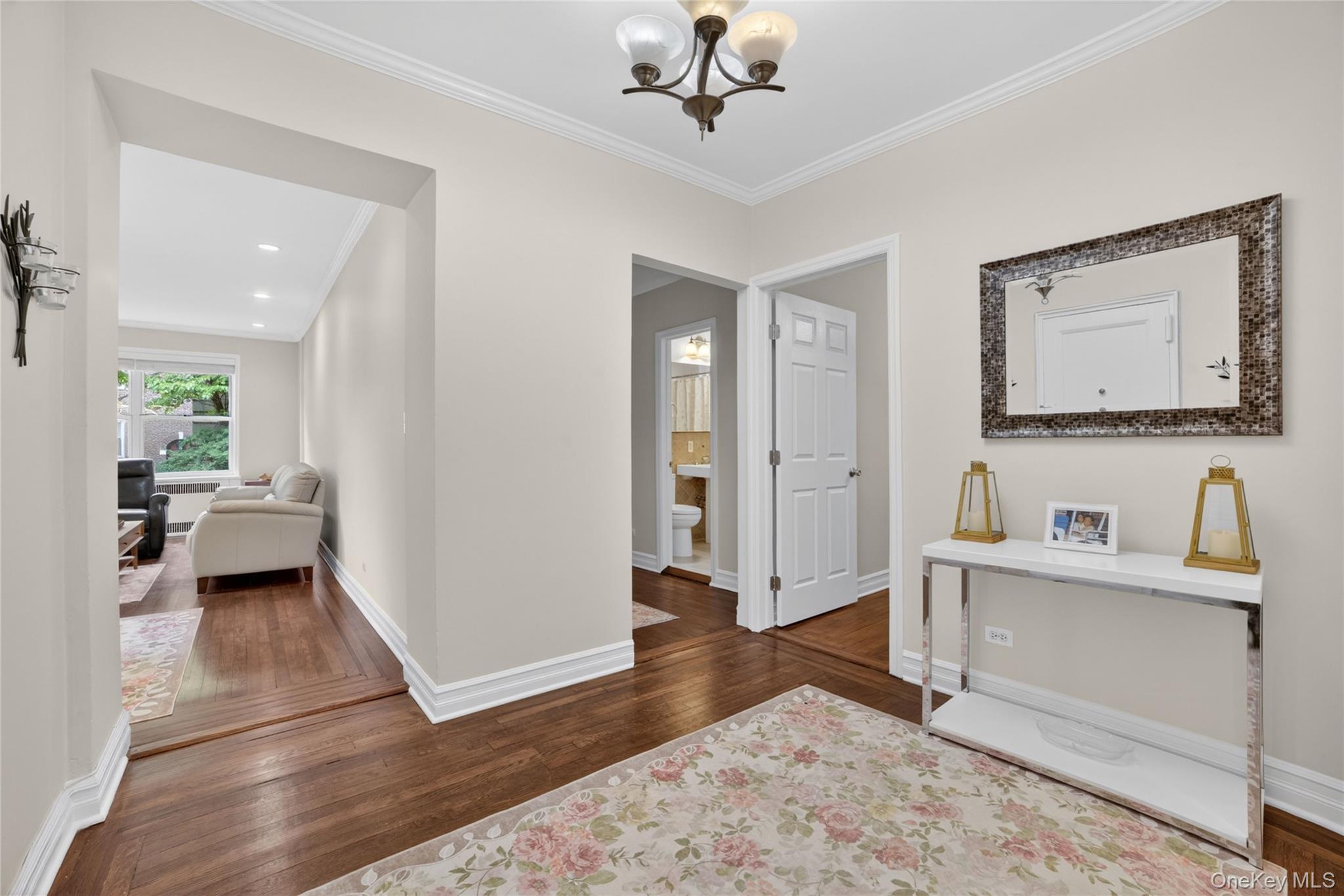 824 Palmer Road, Unit 1F Bronxville, NY 10708 - Photo 3 of 26 a view of a bedroom with furniture window and wooden floor