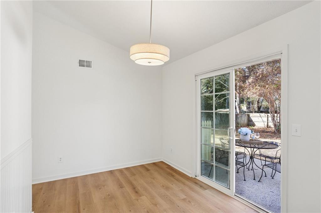5457 Rails Way Norcross, GA 30071 - Photo 13 of 30 an empty room with windows