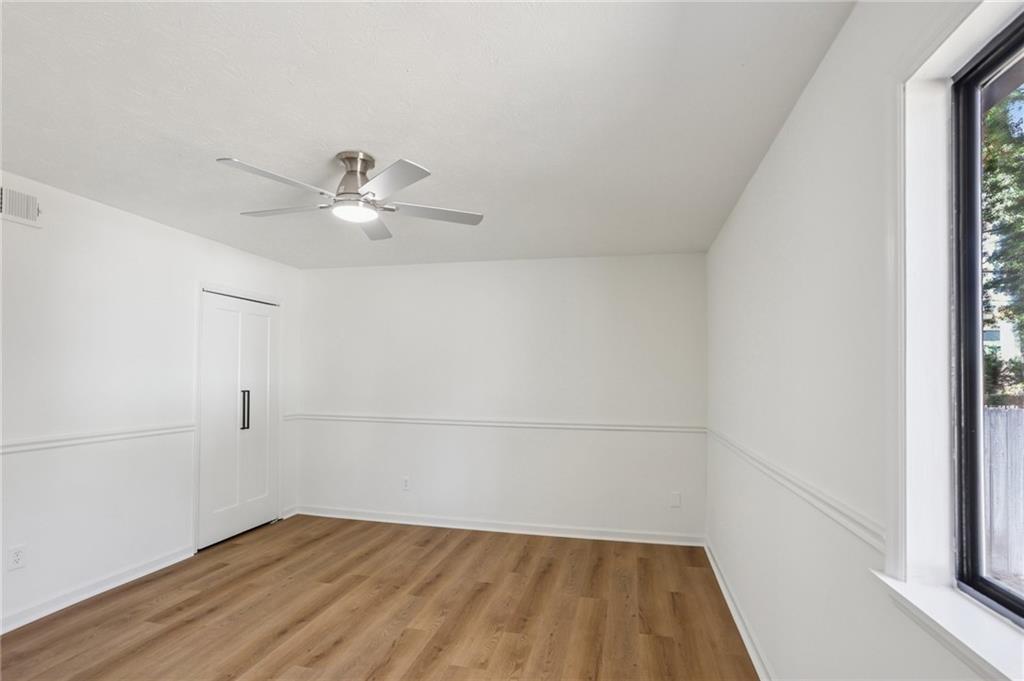 5457 Rails Way Norcross, GA 30071 - Photo 14 of 30 wooden floor in an empty room