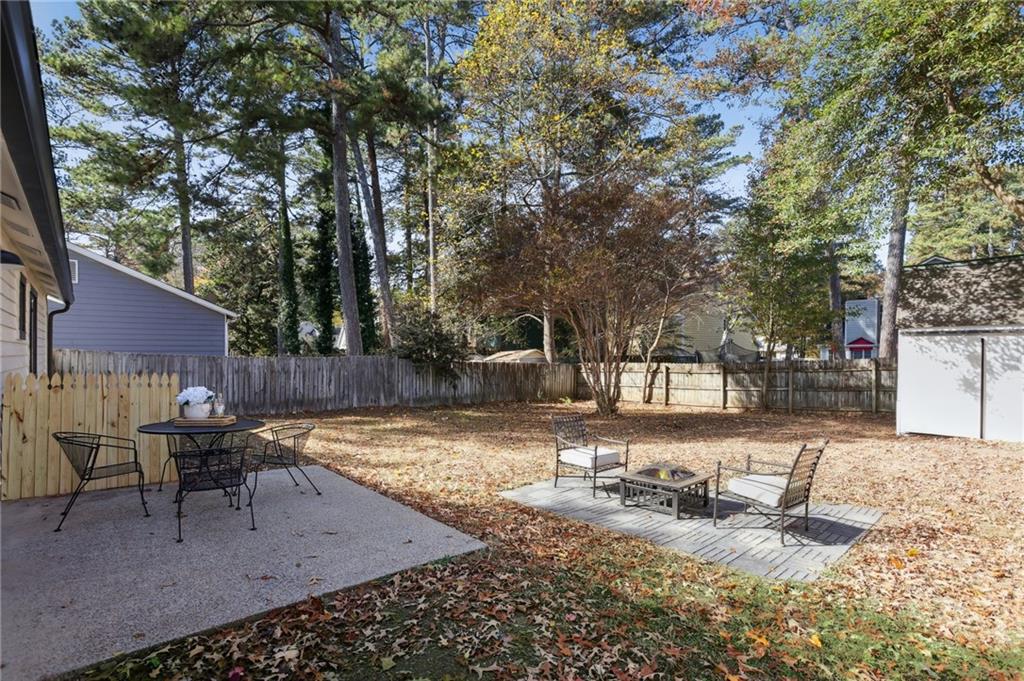 5457 Rails Way Norcross, GA 30071 - Photo 20 of 30 a view of a yard with a patio