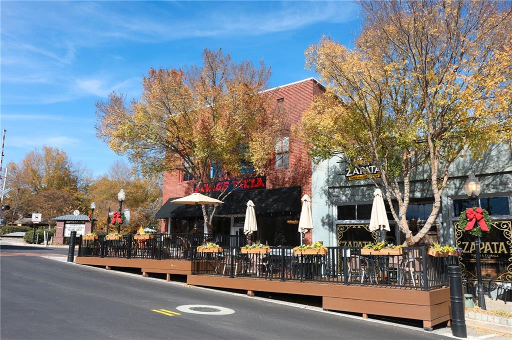 5457 Rails Way Norcross, GA 30071 - Photo 28 of 30 a front view of a building with street view