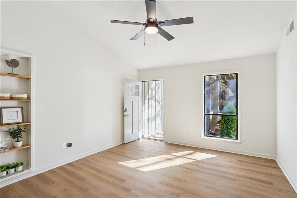 5457 Rails Way Norcross, GA 30071 - Photo 4 of 30 a view of an empty room with a window