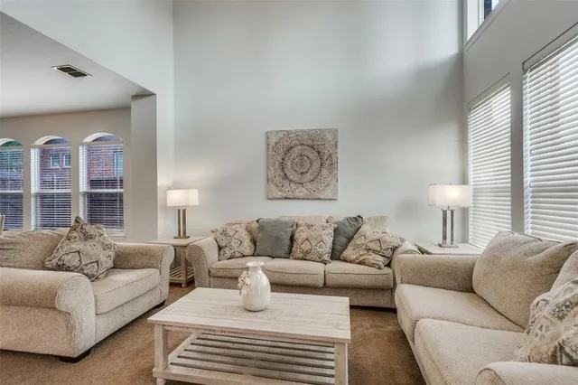 a living room with furniture and a couch