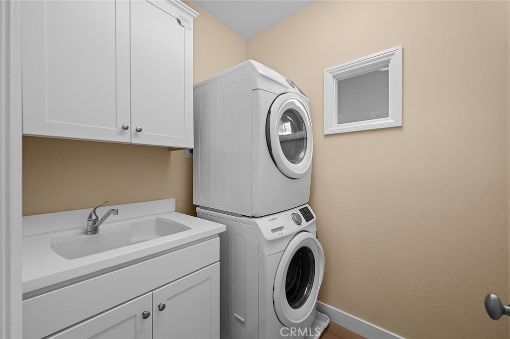 143 Rodeo Irvine, CA 92602 - Photo 19 of 37 a utility room with dryer and washer