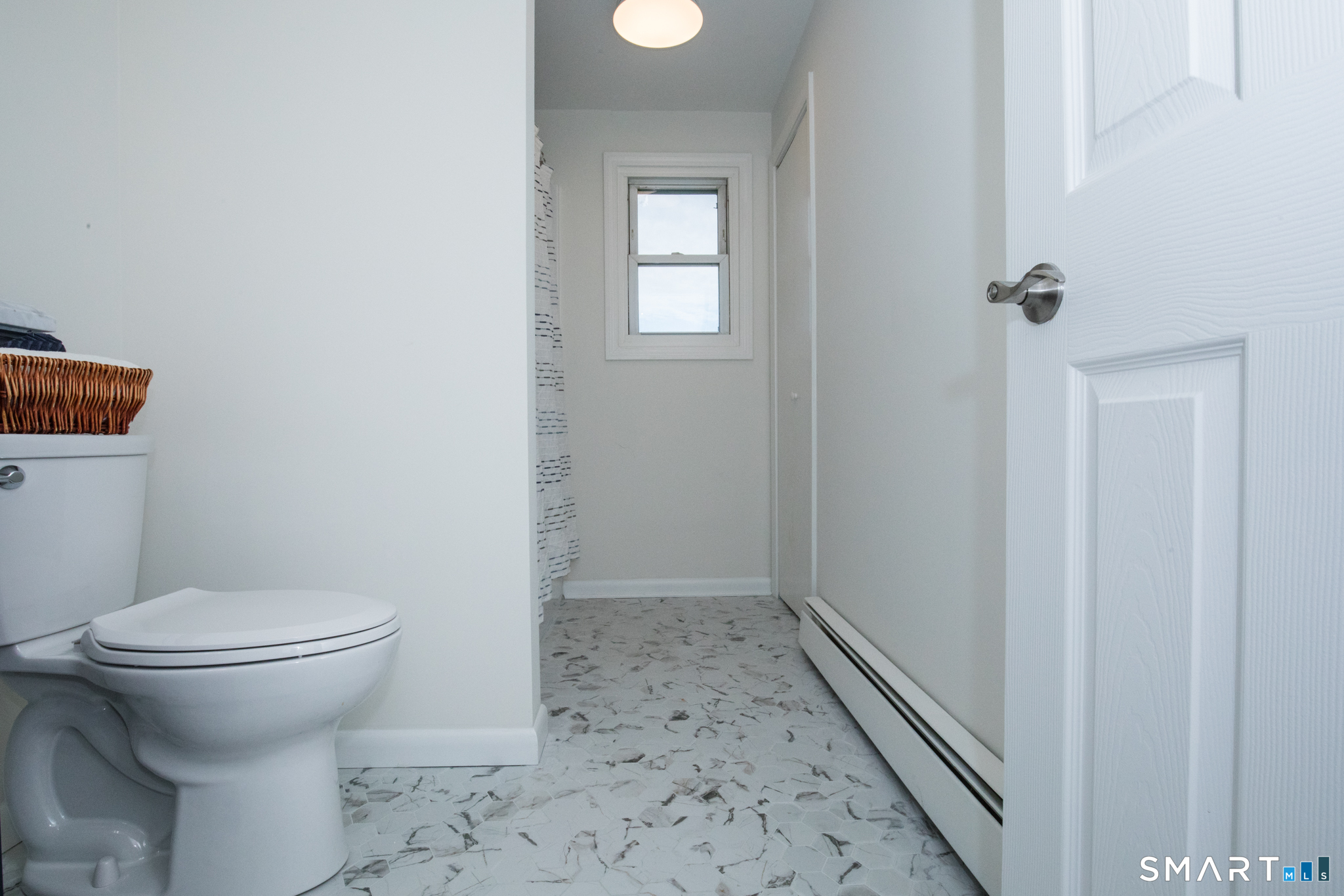 291 Cartpath Drive Meriden, CT 06450 - Photo 16 of 30 a bathroom with a toilet and a shower