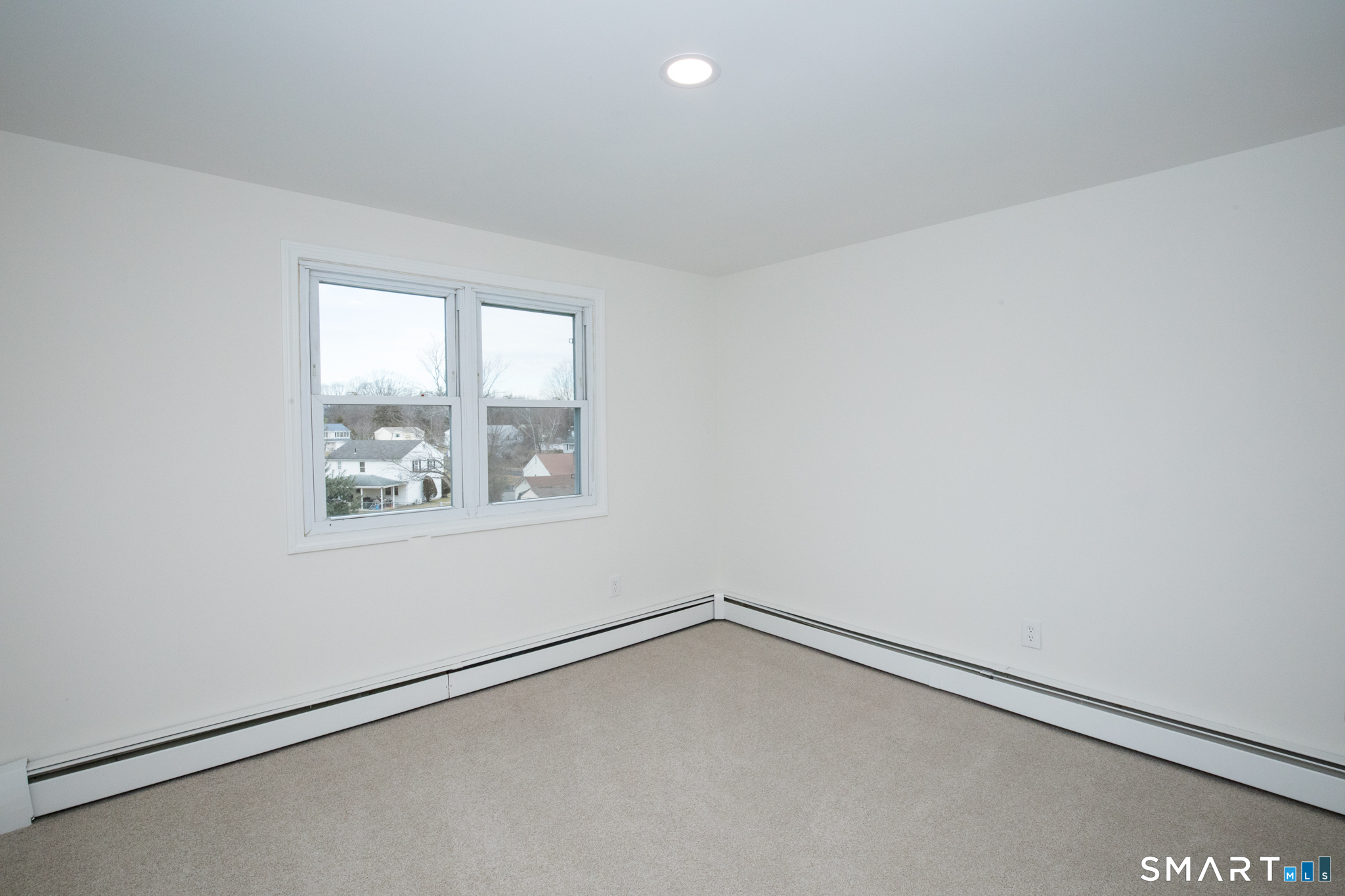 291 Cartpath Drive Meriden, CT 06450 - Photo 21 of 30 an empty room with a window