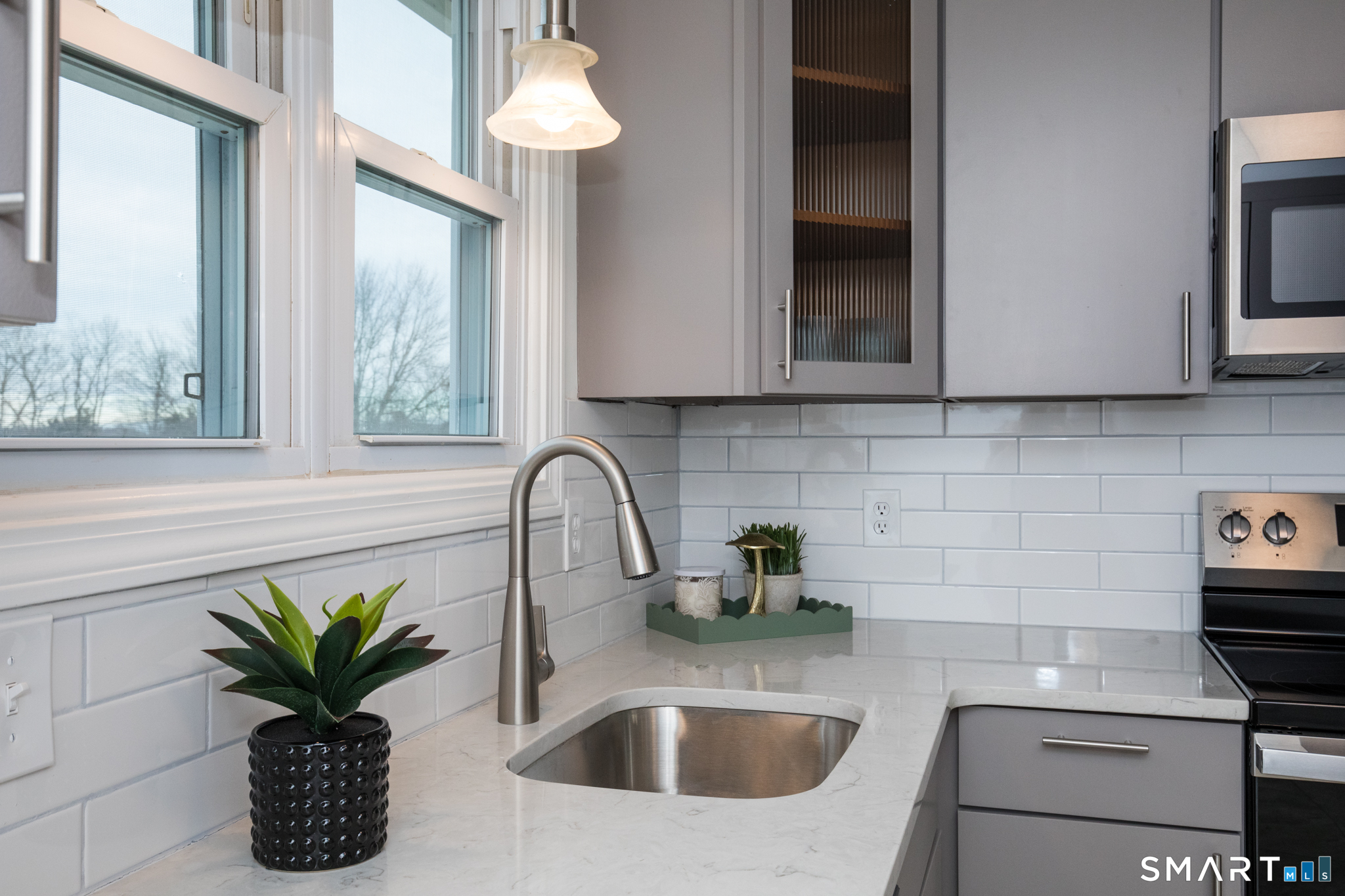 291 Cartpath Drive Meriden, CT 06450 - Photo 8 of 30 a view of kitchen sink microwave and refrigerator