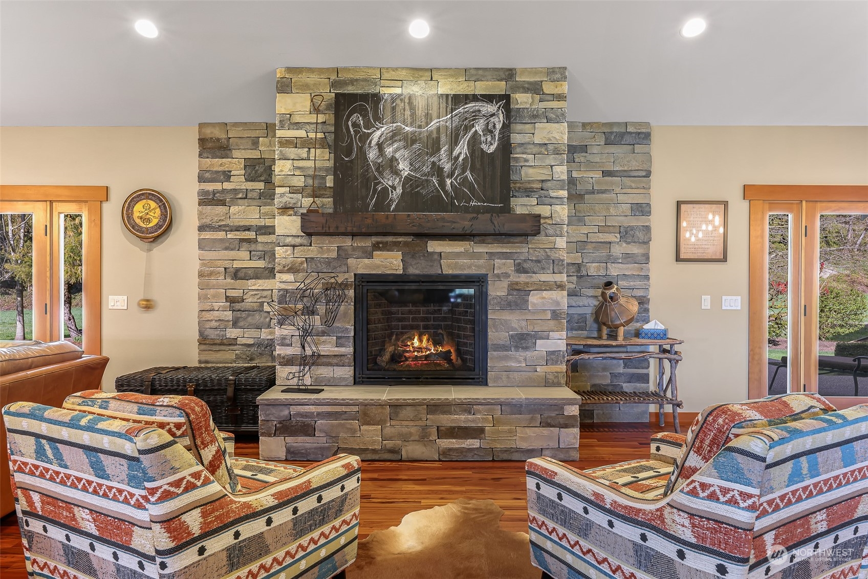 3678 Osgood Road Everson, WA 98247 - Photo 11 of 40 a living room with furniture and a fireplace