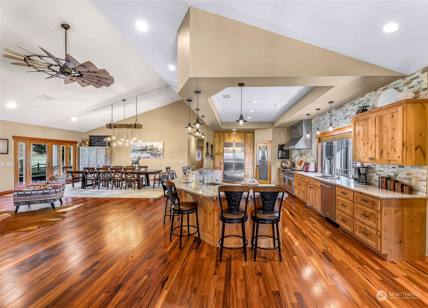 3678 Osgood Road Everson, WA 98247 - Photo 17 of 40 a view of a dining room with furniture window and wooden floor