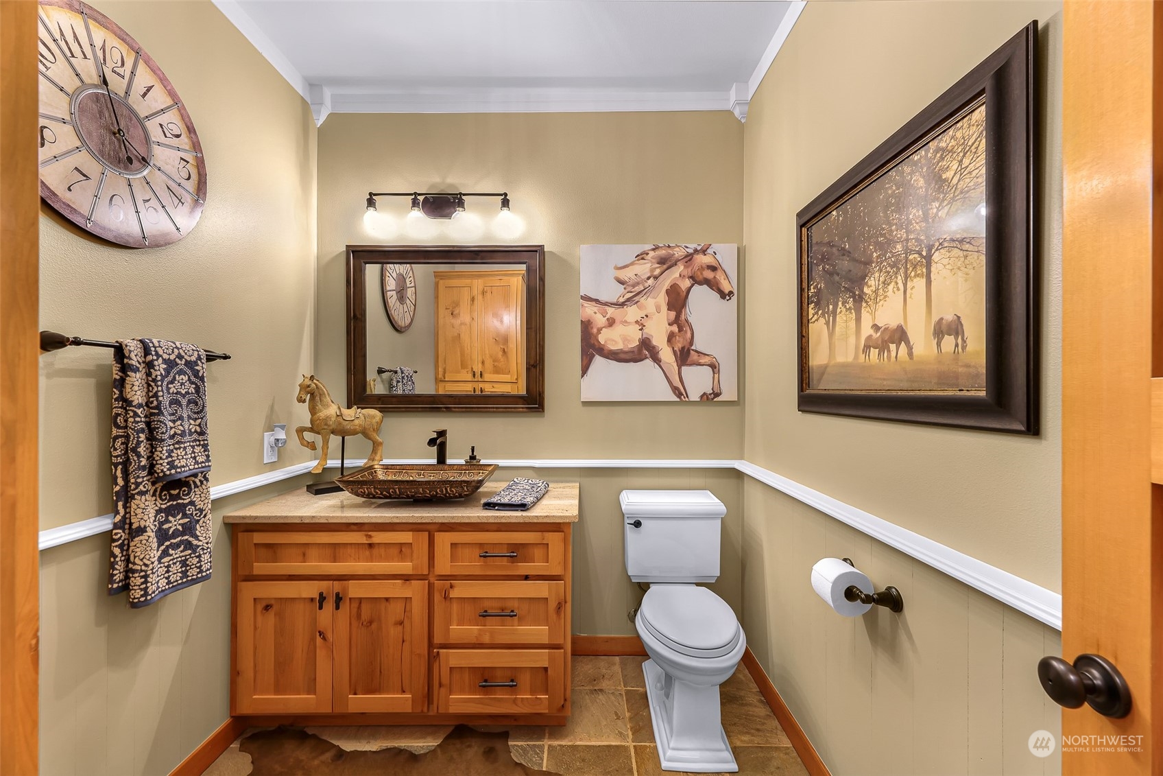 3678 Osgood Road Everson, WA 98247 - Photo 18 of 40 a bathroom with a toilet a sink and mirror