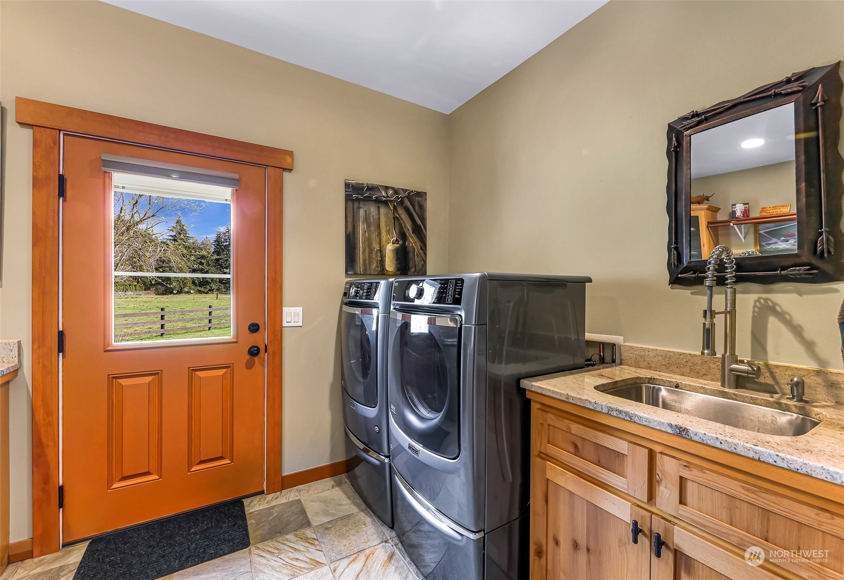3678 Osgood Road Everson, WA 98247 - Photo 20 of 40 a bathroom with a sink and a mirror