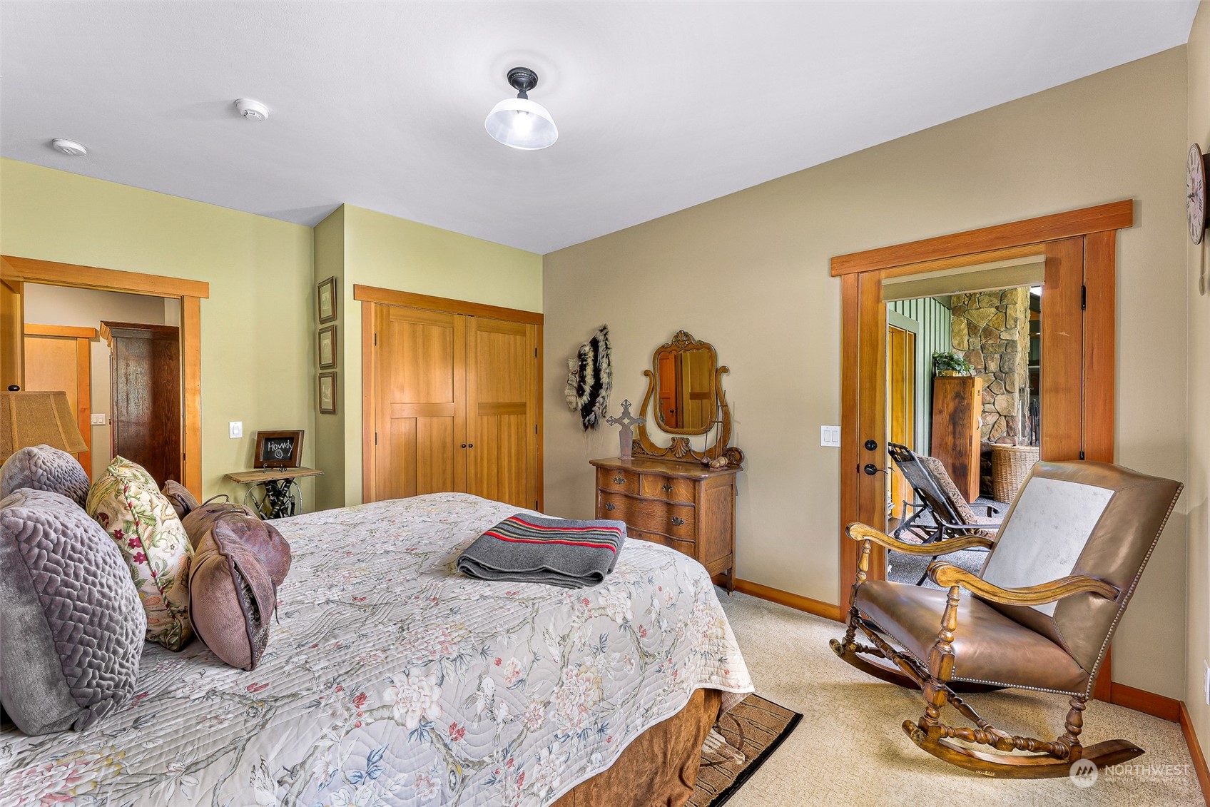 3678 Osgood Road Everson, WA 98247 - Photo 21 of 40 a bedroom with a bed and wooden floor