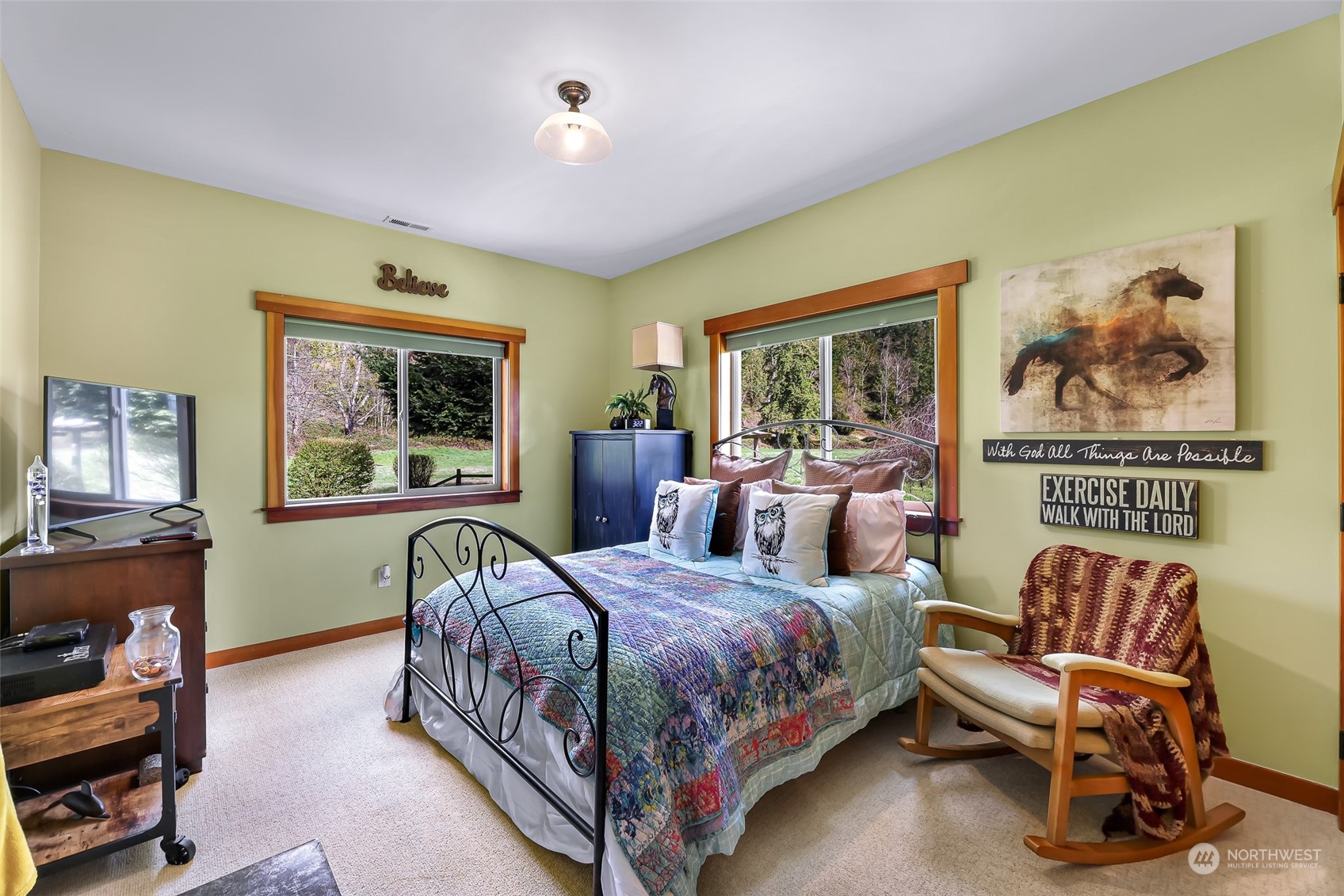 3678 Osgood Road Everson, WA 98247 - Photo 24 of 40 a bedroom with a bed a couch and a window