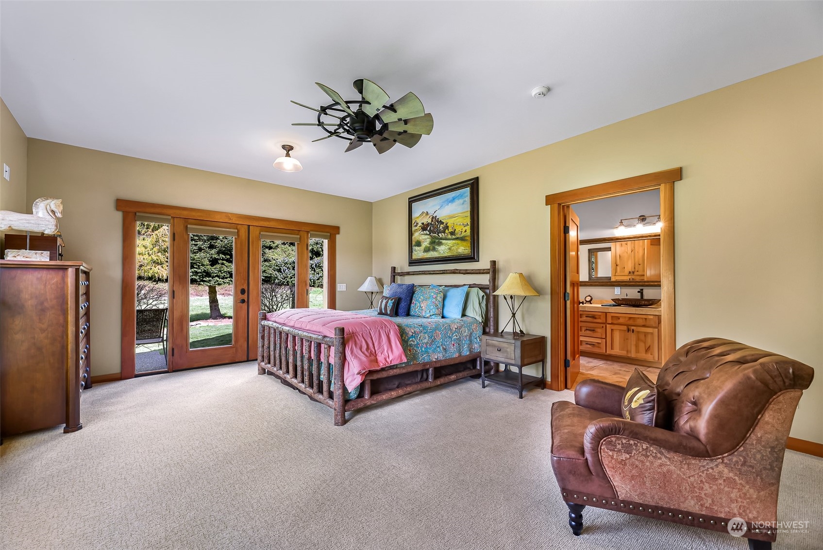 3678 Osgood Road Everson, WA 98247 - Photo 27 of 40 a spacious bedroom with a bed couch and window