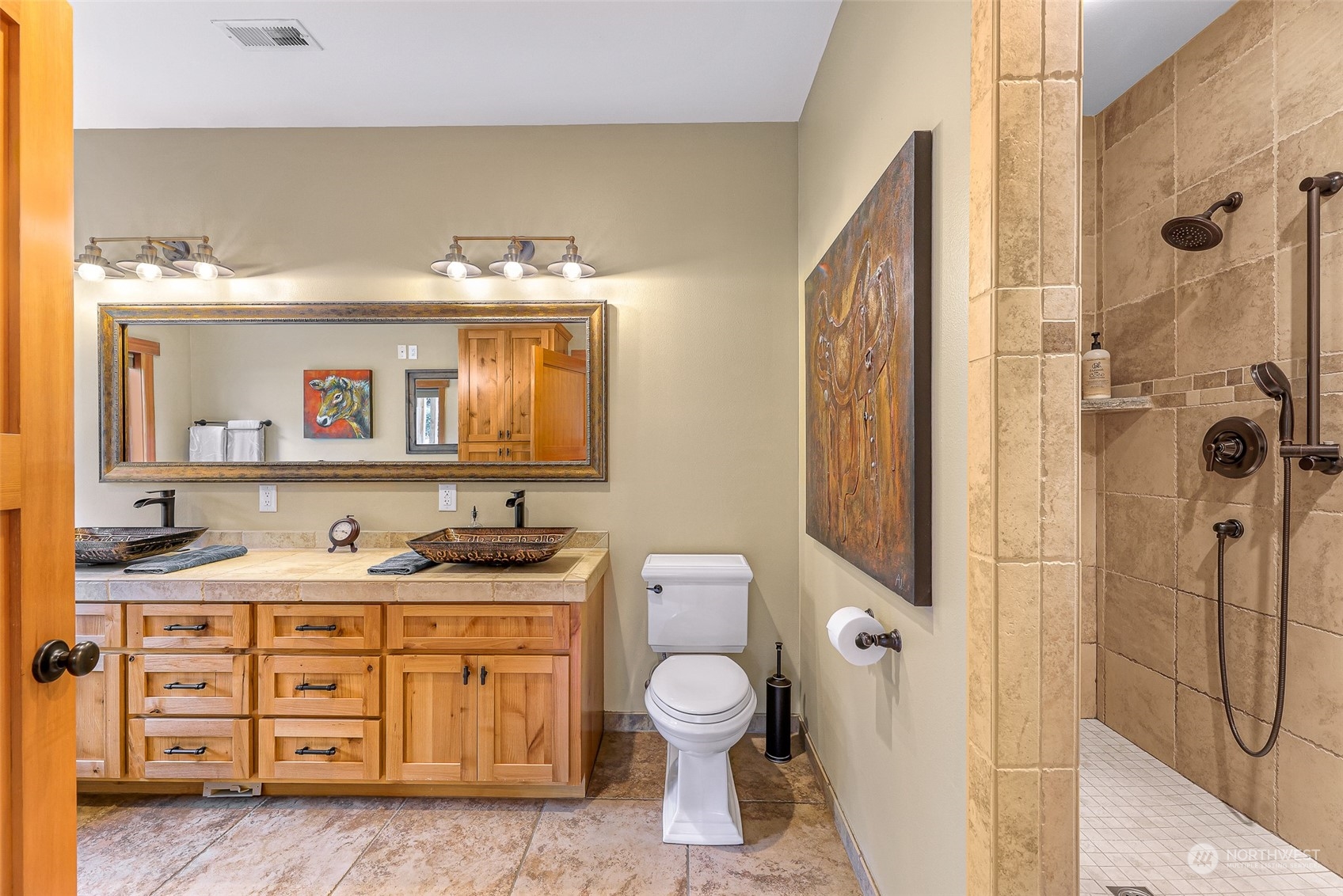 3678 Osgood Road Everson, WA 98247 - Photo 28 of 40 a bathroom with a granite countertop sink toilet a mirror a vanity and shower