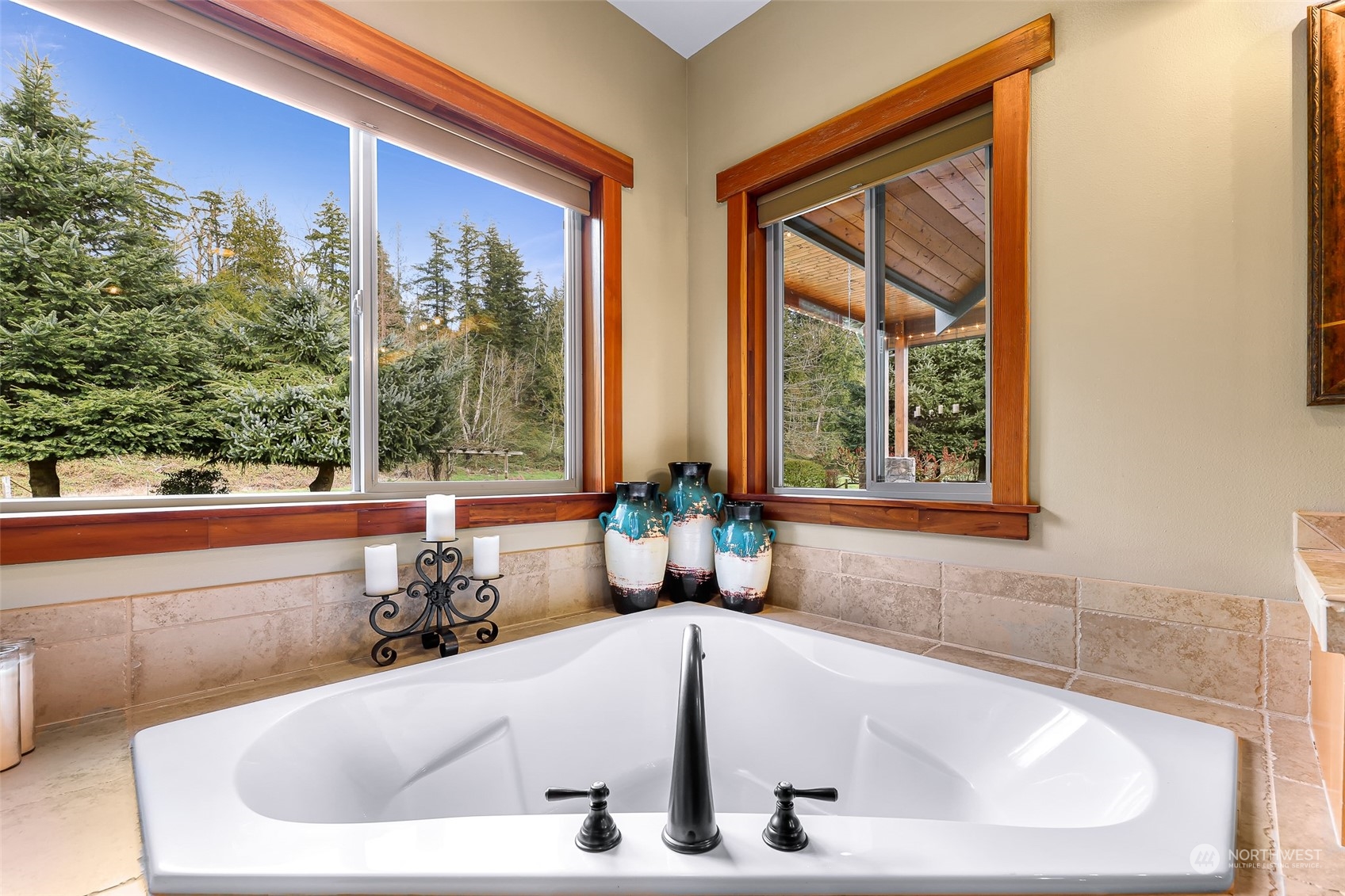 3678 Osgood Road Everson, WA 98247 - Photo 31 of 40 a bath tub sitting in a bathroom next to a window