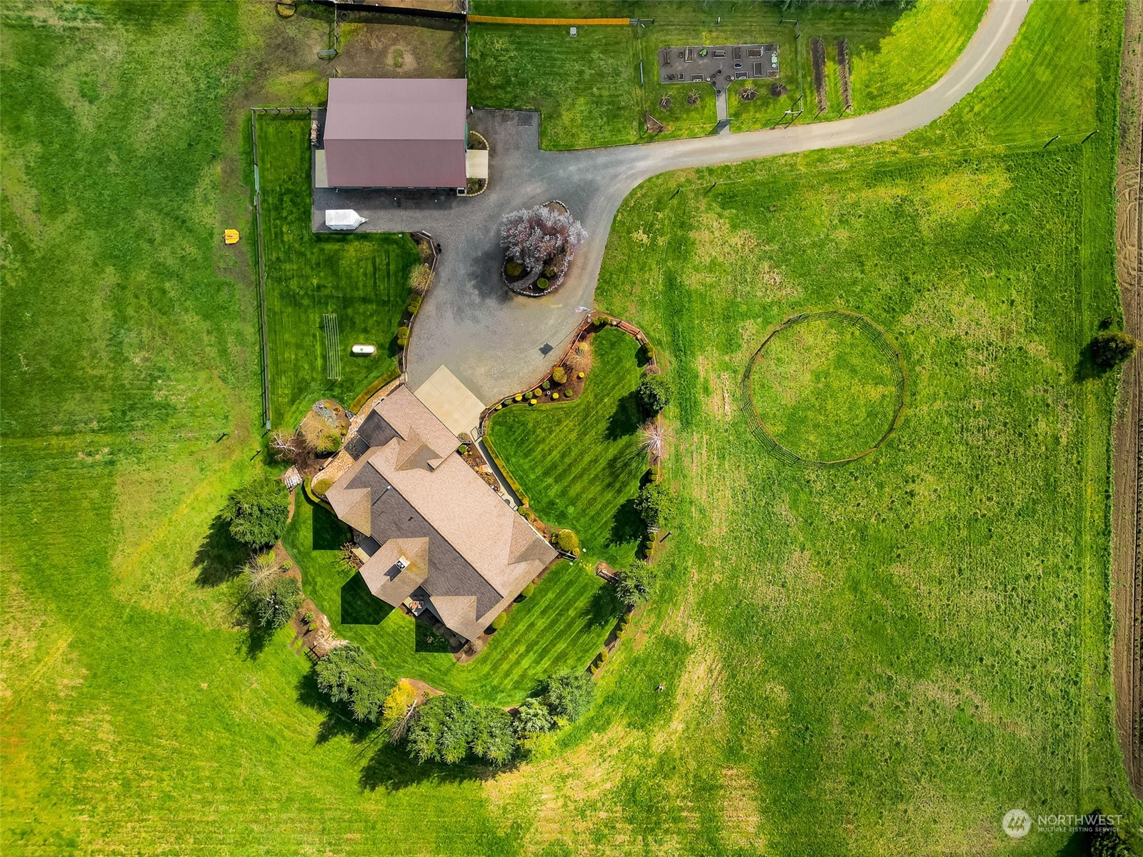 3678 Osgood Road Everson, WA 98247 - Photo 38 of 40 an aerial view of a house with a garden
