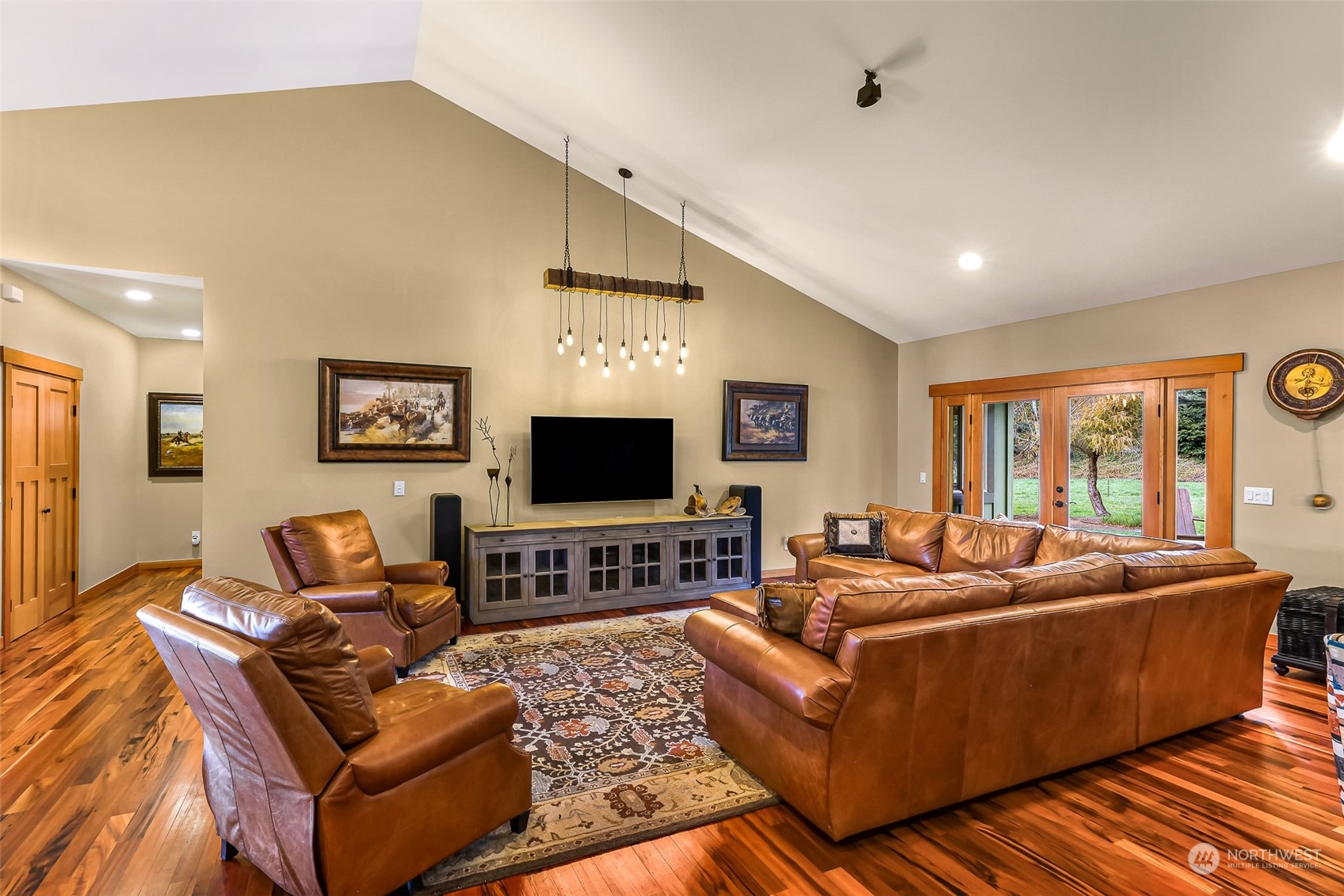 3678 Osgood Road Everson, WA 98247 - Photo 8 of 40 a living room with furniture and a flat screen tv