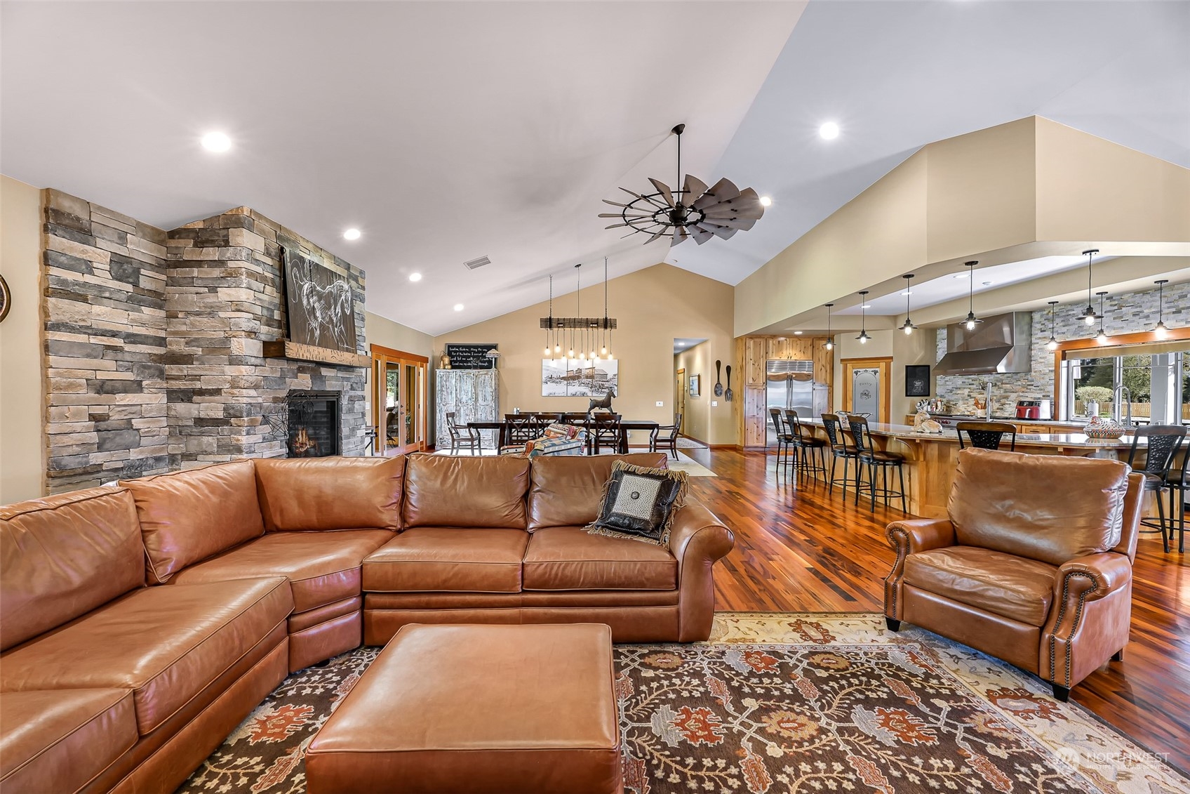 3678 Osgood Road Everson, WA 98247 - Photo 10 of 40 a living room with furniture ceiling fan and a rug