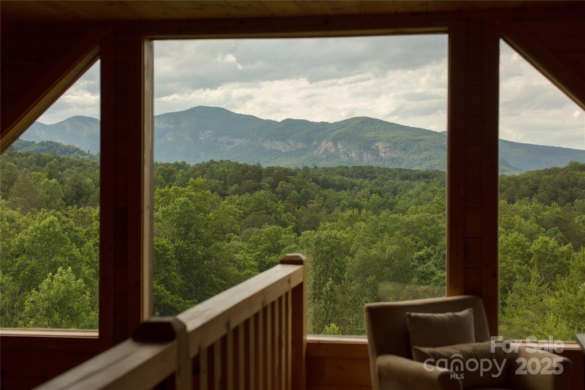 206 Legend Dr Mill Spring Mill Spring, NC 28756 - Photo 31 of 48 a view of a two chair in the balcony