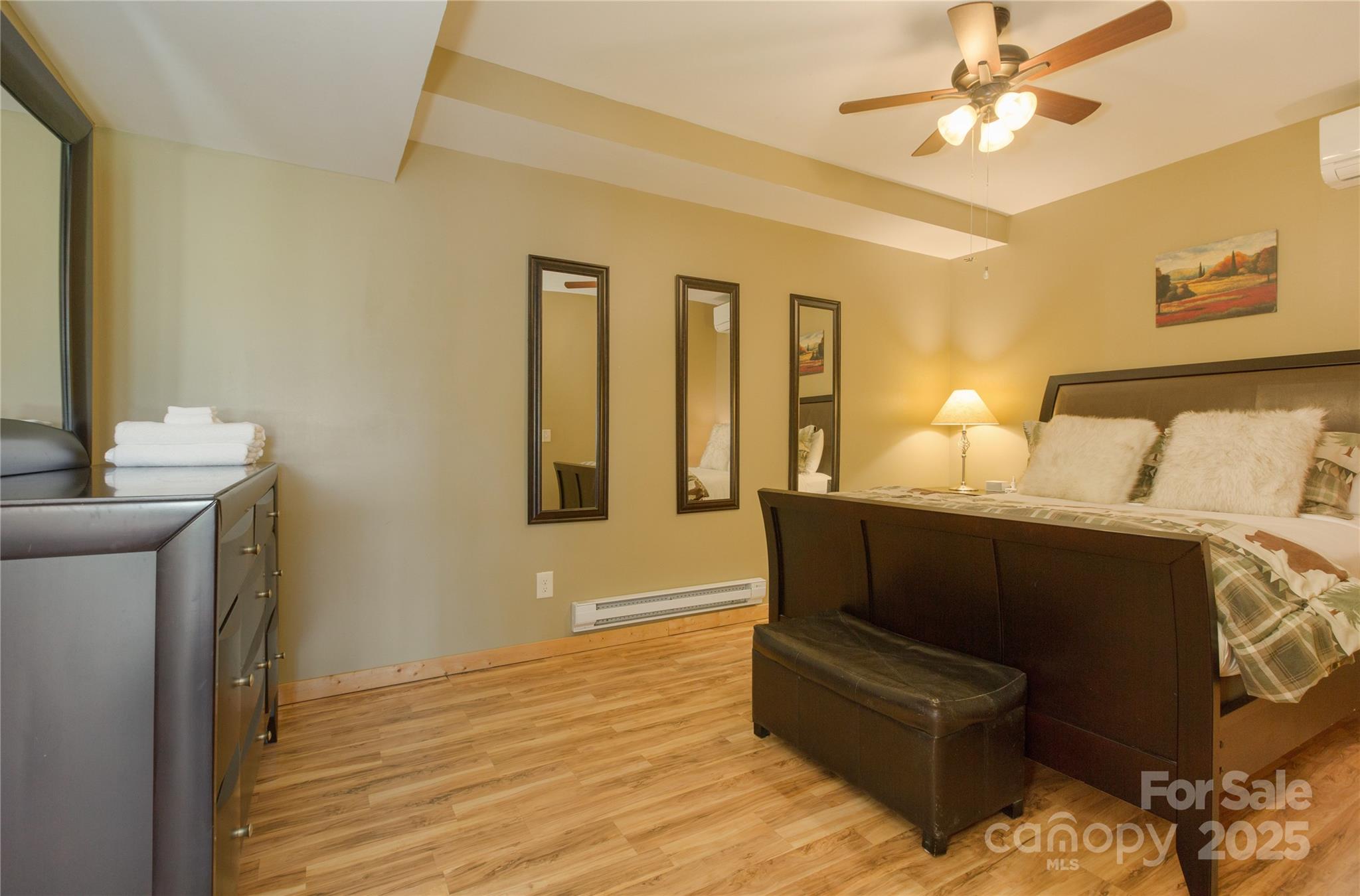 206 Legend Dr Mill Spring Mill Spring, NC 28756 - Photo 46 of 48 a living room with furniture and a wooden floor