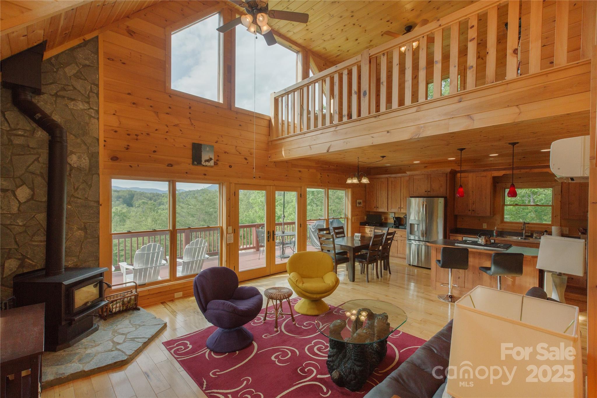206 Legend Dr Mill Spring Mill Spring, NC 28756 - Photo 5 of 48 a living room with furniture fireplace and flat screen tv