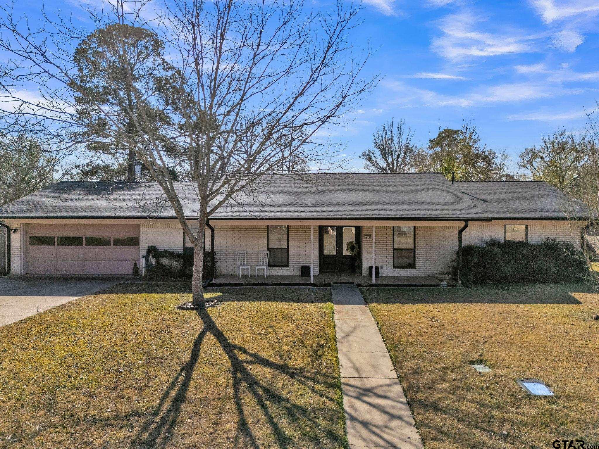 1208 Briarwood Lane Longview, TX 75604 - Photo 1 of 43 a front view of house with yard space and trees