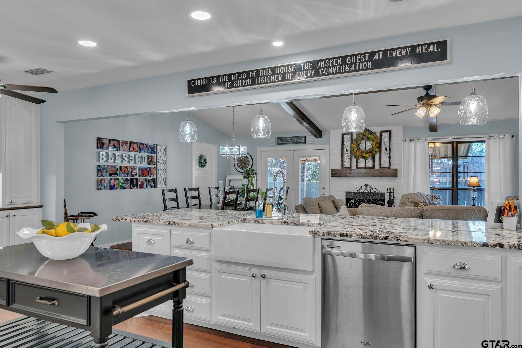 1208 Briarwood Lane Longview, TX 75604 - Photo 15 of 43 a kitchen with a sink cabinets and wooden floor