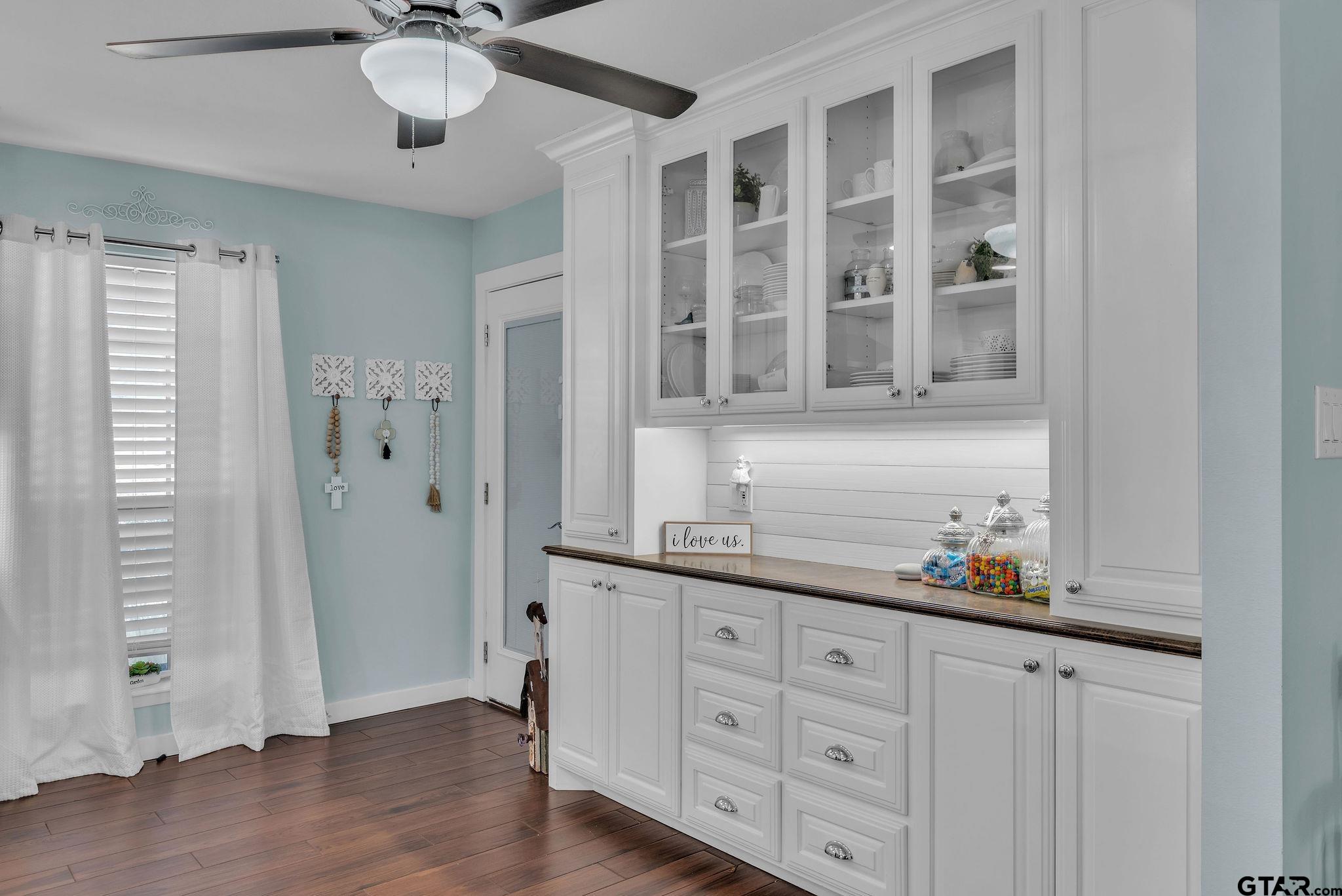 1208 Briarwood Lane Longview, TX 75604 - Photo 17 of 43 a kitchen with stainless steel appliances granite countertop a sink and cabinets