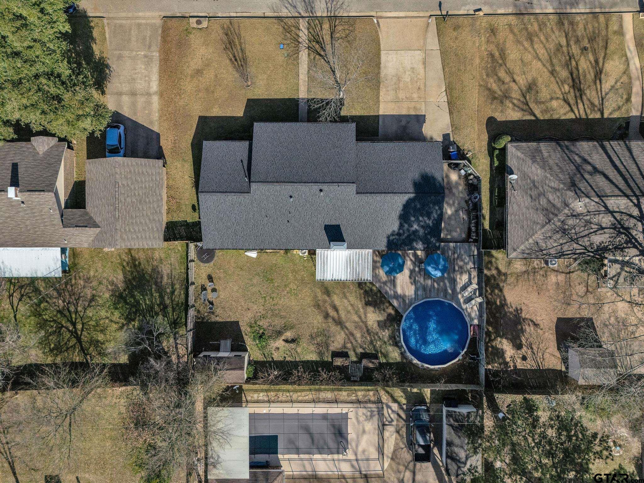1208 Briarwood Lane Longview, TX 75604 - Photo 39 of 43 an aerial view of a house with a yard