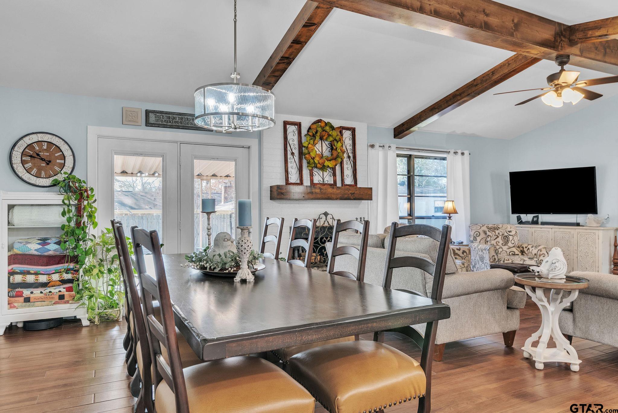 1208 Briarwood Lane Longview, TX 75604 - Photo 9 of 43 a view of a dining room with furniture and wooden floor
