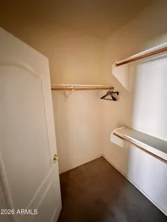 a view of small space with racks on the wall